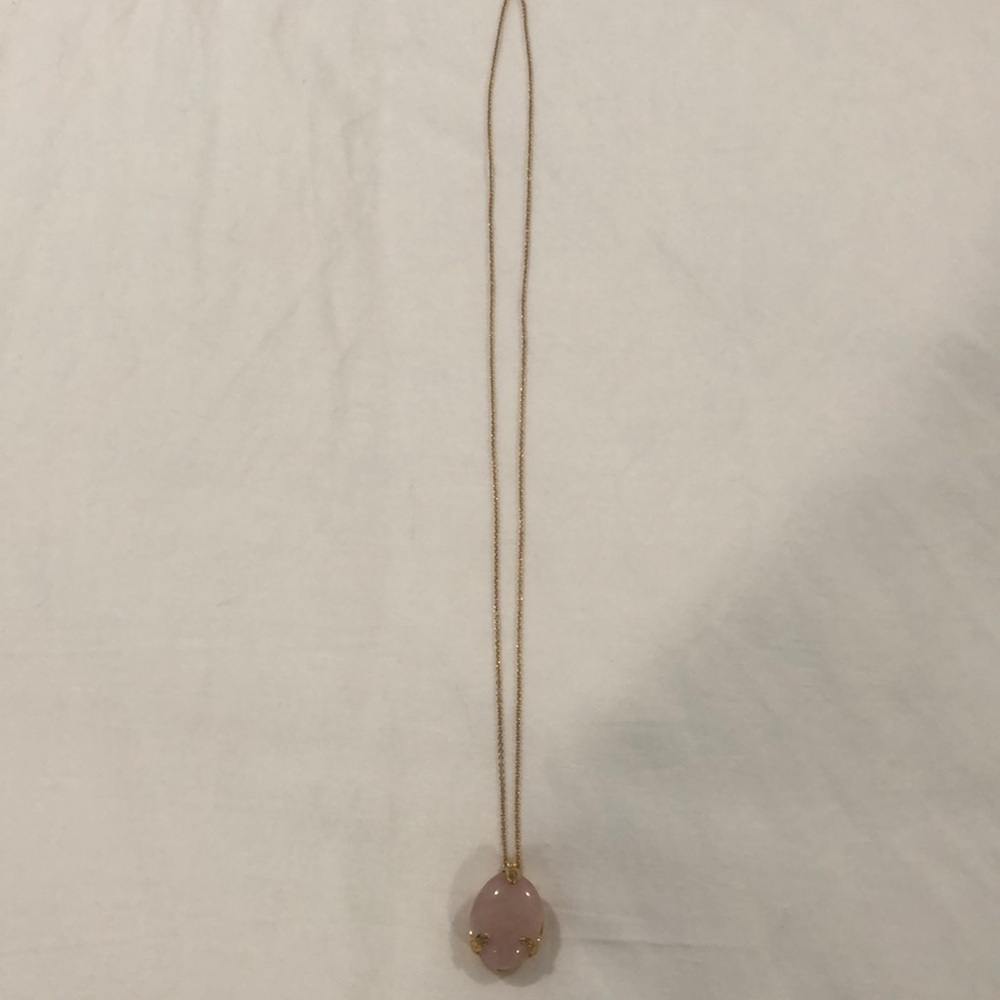 Ann Taylor long gold necklace with pink stone.